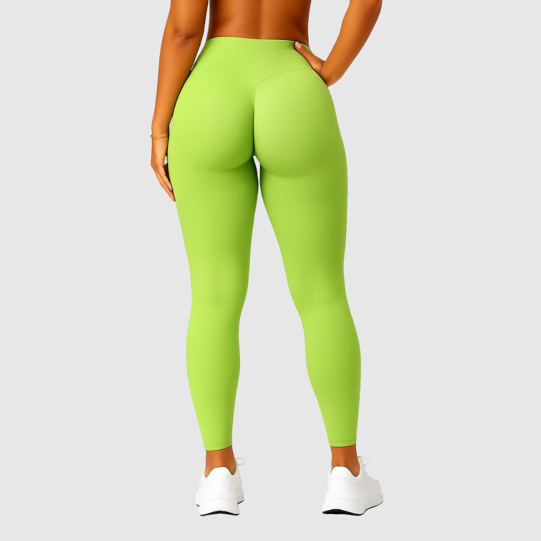 Rückansicht der Vibe Scrunch Leggings in Neon-Lime mit formendem Scrunch-Effekt am Po