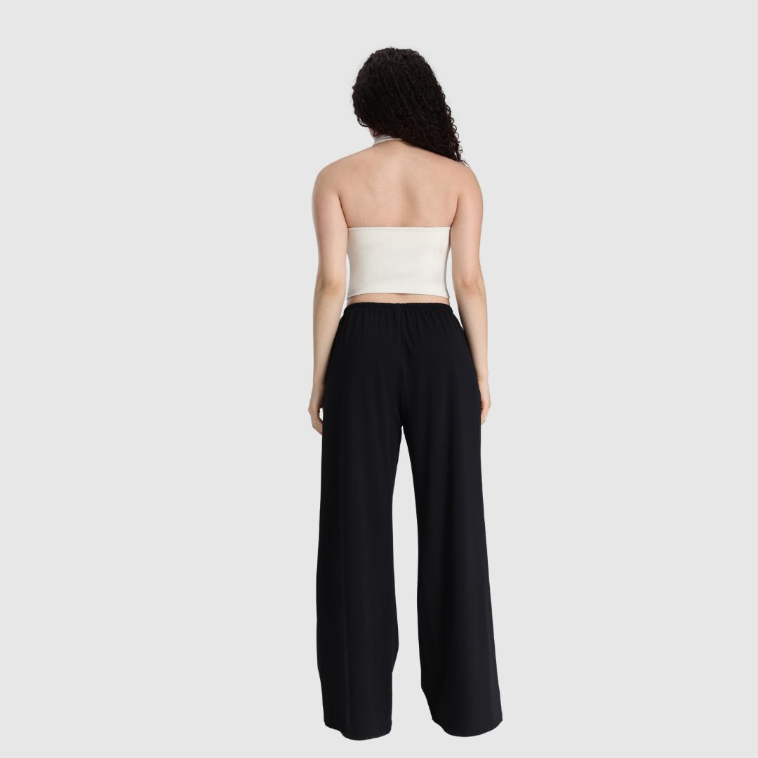 Rückansicht der schwarzen UNANIMOUS Everyday Wide Leg Pants mit weitem Bein